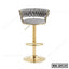 Modern bar stool with tufted grey backrest, gold metal base, and footrest, model BS-2515