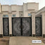 Modern CNC-cut metal boundary gate with intricate floral patterns in front of a contemporary house