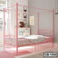 Pink metal canopy bed frame with heart-shaped accents in a modern, bright bedroom.