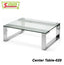 Modern glass center table with chrome metal legs, rectangular design, minimalistic style