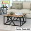 Modern center table with wooden top and black metal frame in a living room setting