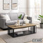 Modern center table with wood top and black metal frame in a stylish living room setting