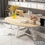 Modern oval wooden center table with white metal legs in a stylish living room setting