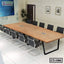 Modern rectangular wooden conference table with black chairs in a meeting room, model CT-1086