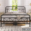 Modern double steel bed with geometric frame in a bright bedroom, decorative pillows, and baskets underneath.