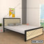 Modern double steel bed with tufted upholstered headboard in a bright bedroom