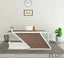 Modern office reception desk with wood finish and white trim, laptop, plants, and wall clock
