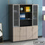 Modern wooden office file cabinet with glass doors and storage shelves against blue wall