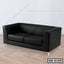 Modern black office sofa with metal legs on wooden floor in minimalist room