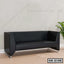 Modern black office sofa with angular armrests and metal legs in a minimalist room