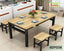 Modern dining table set with four wooden benches and black metal frame, table set for six.
