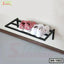Wall-mounted metal shoe rack with pink and white sneakers, modern home organization