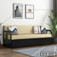 Modern sofa cum bed with beige cushions, dark frame, and throw pillows in a living room setting