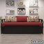 Modern sofa cum bed with maroon cushions and floral pillows in a stylish living room