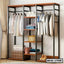 Standing closet organizer with shelves, hanging clothes, storage boxes, and shoes