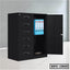 Black steel file cabinet with drawers and open door, storing blue office binders