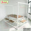 Modern swing table set with wooden seats and metal frame in bright room