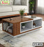 Modern wooden tea table with open shelves in a living room on a patterned rug