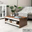 Modern wooden tea table with storage shelf in a stylish living room setting
