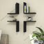 Modern black wall shelves with books and decor, mounted on a beige living room wall.