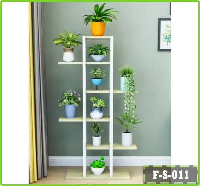 6-tier flower rack with potted plants in a modern living room, against a green wall
