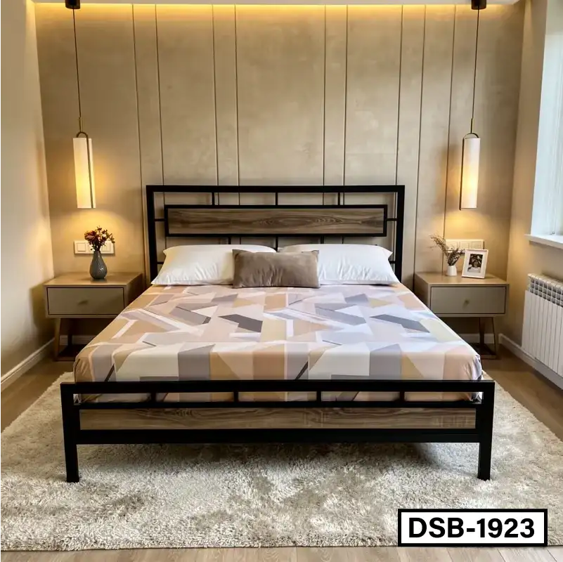 Modern king size bed with geometric bedsheet, wooden headboard, and bedside tables in a well-lit bedroom