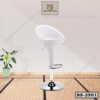 Modern white bar stool with chrome base on a woven floor, indoor setting, BS-2501 model.