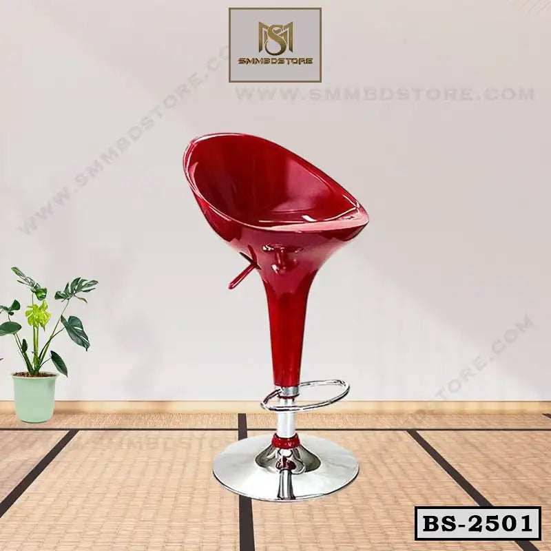 Modern red bar stool with chrome base and footrest on a mat floor, indoor setting Main image
