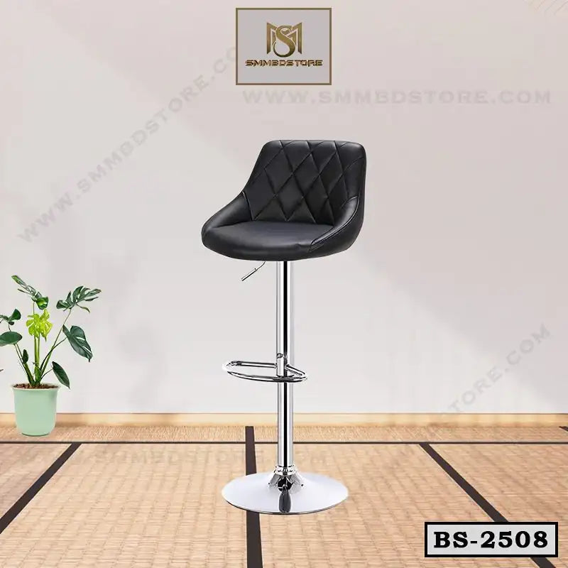 Modern black leather bar stool with chrome base and footrest in a minimal indoor setting