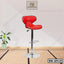 Modern red bar stool with chrome base and footrest on a tatami mat floor