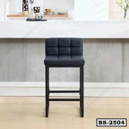 Modern black bar stool with cushioned seat and backrest in home kitchen setting
