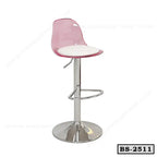 Modern pink acrylic bar stool with chrome base and white cushioned seat