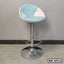 Modern adjustable bar stool with blue and white cushioned seat and chrome base