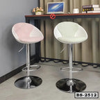 Modern adjustable bar stools with chrome bases and pastel seats in a home office setting