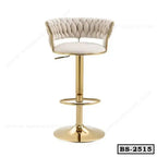 Modern gold bar stool with tufted beige backrest and footrest for home or office