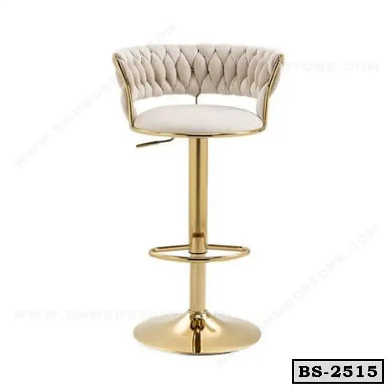 Modern gold bar stool with tufted beige backrest and footrest for home or office