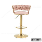 Modern pink velvet bar stool with gold metal base and tufted backrest