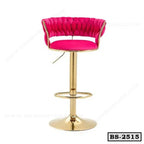 Modern pink bar stool with tufted backrest and gold metal base, adjustable height.