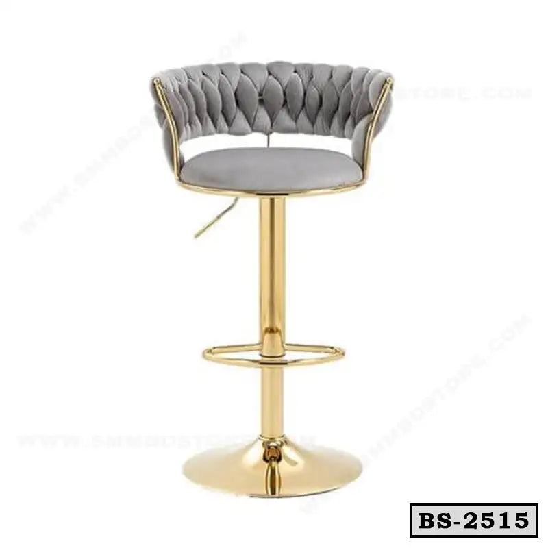 Modern bar stool with tufted grey backrest, gold metal base, and footrest, model BS-2515