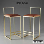 Modern gold metal bar stools with brown cushioned seats, minimalist home or office furniture