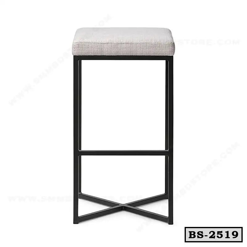 Modern bar stool with cushioned beige seat and black metal frame, minimalist design