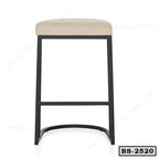Modern bar stool with beige cushioned seat and black metal frame, minimalist design.