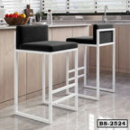 Modern black and white bar stools with metal frame in a kitchen setting