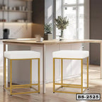 Modern white and gold bar stools in a bright kitchen, home furniture decor seating