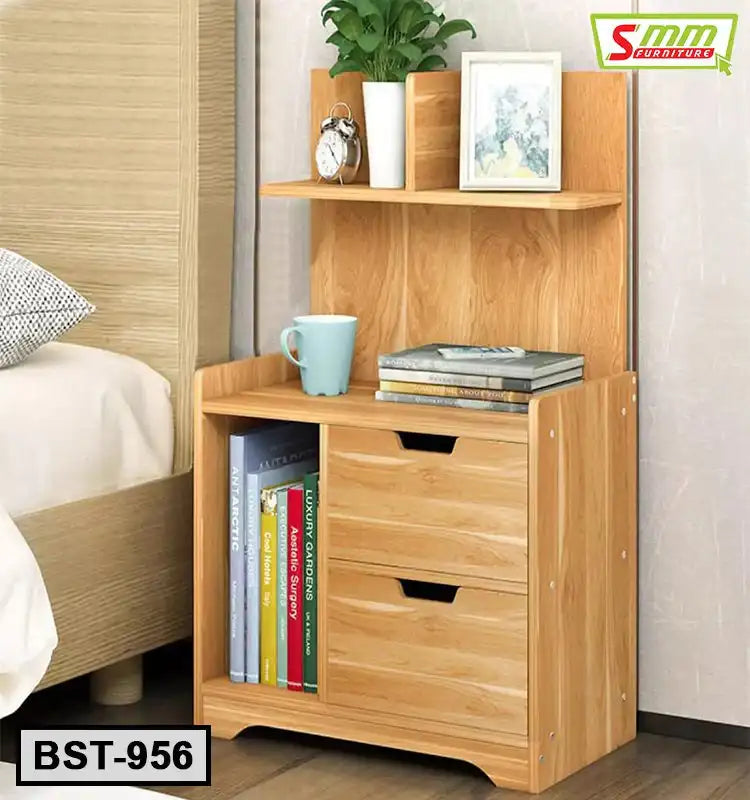 Wooden bedside table with storage drawers, books, shelf, and decor by a bed Main image