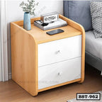 Modern wooden bedside table with two white drawers beside a bed, home furniture in Bangladesh