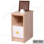 Modern wooden bedside table with open shelf and single drawer, cup and tray on top.