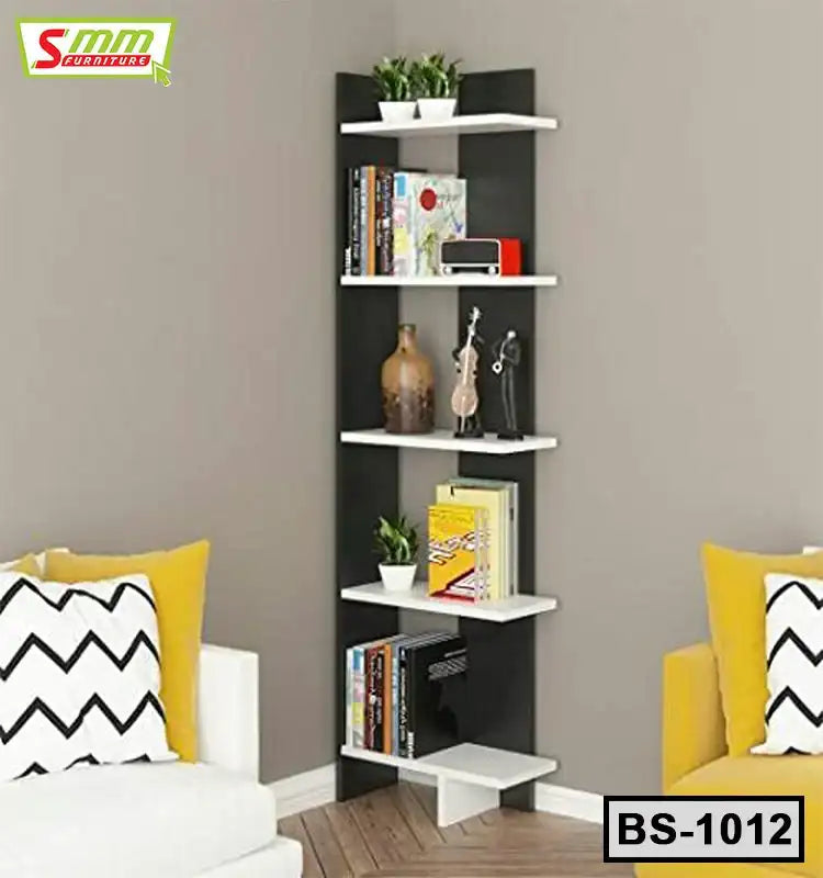 Modern corner bookshelf with white shelves and black frame, decorated with books and plants in a living room