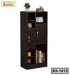 Modern wooden bookshelf with open shelves, two doors, books, decor, and storage compartments