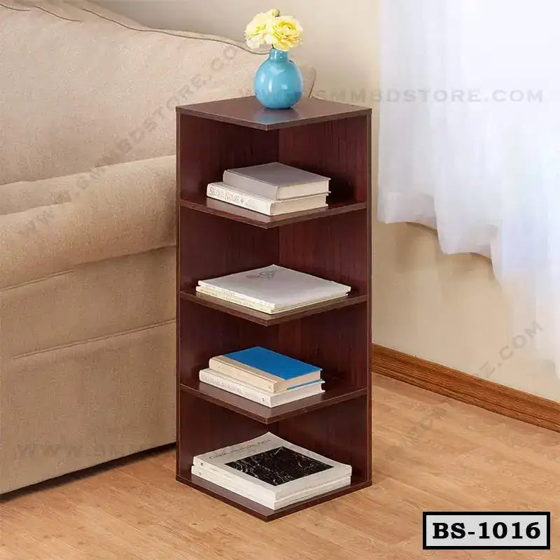 Modern wooden bookshelf with five shelves, books, and a blue vase in a cozy living room